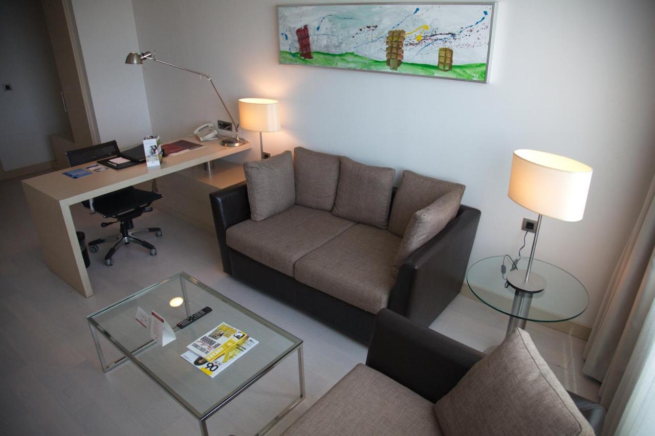 Cpankara Hotel Kültér fotó A living room in a serviced apartment in Paris